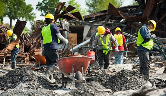 Cannot view this image? Visit: https://images.newsfilecorp.com/files/8530/259766_disaster-cleanup-workers-removing-debris-from-collapsed-structure_550.jpg
